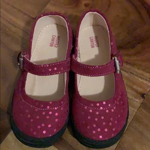 Slightly worn Toddler girl shoes.